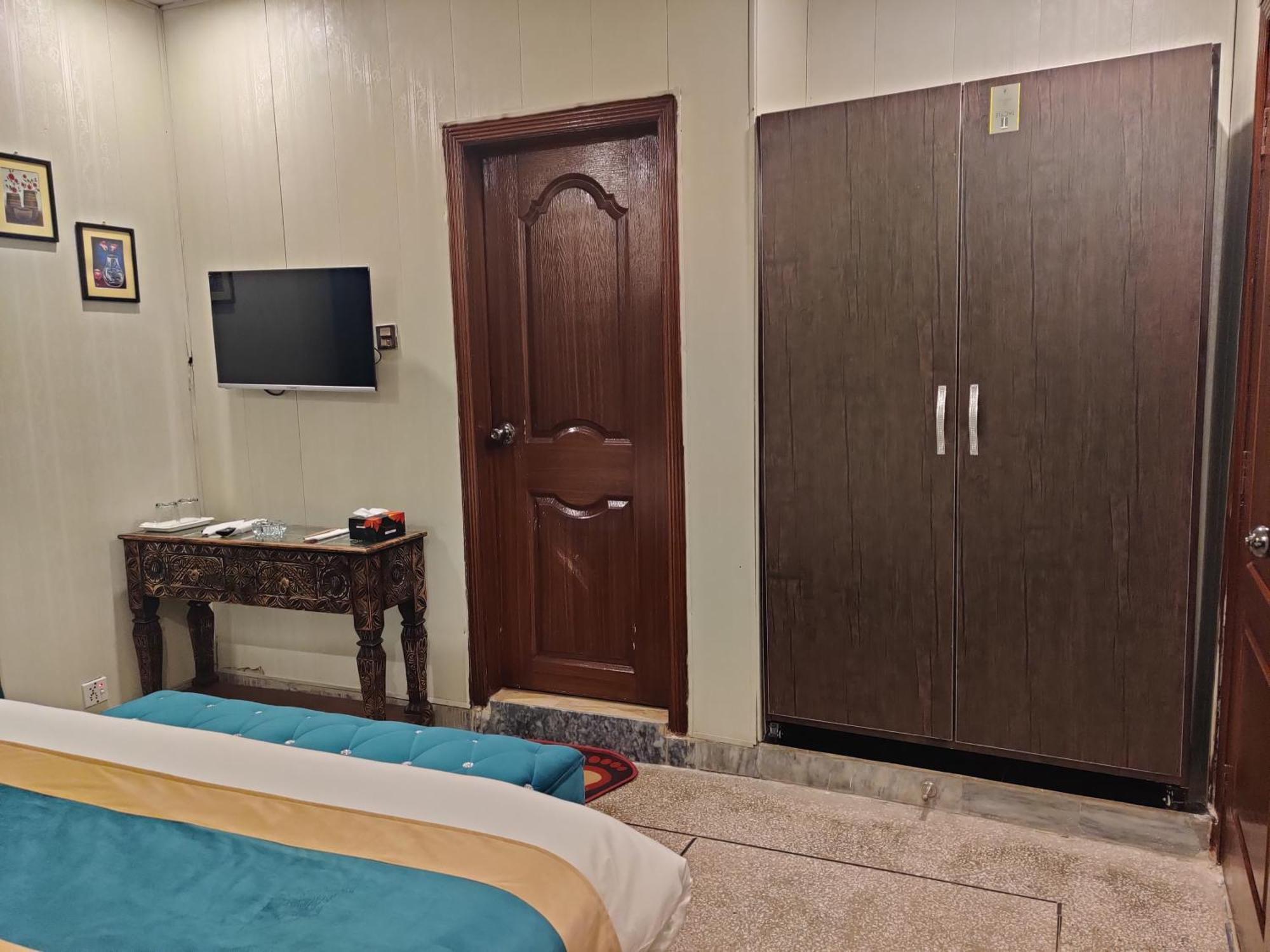 Hotel Swiss Pearl Lahore Phòng bức ảnh